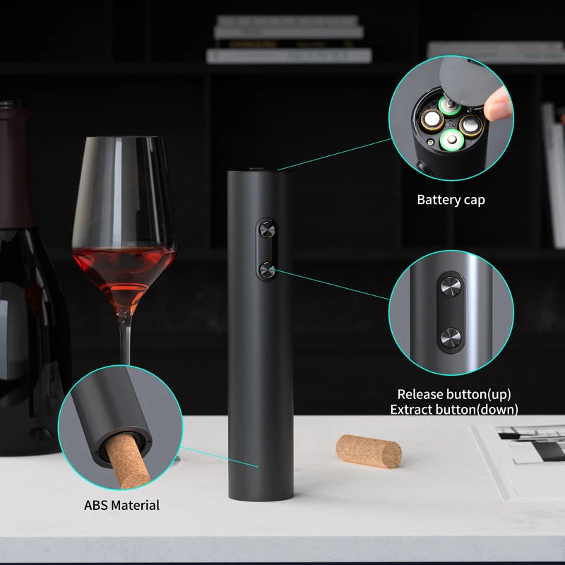 Black electric wine opener with close-up details on a table with a glass of wine and cork.