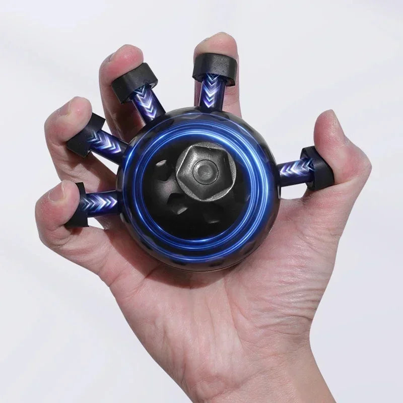 Hand holding a blue and black metal spinner against a white background