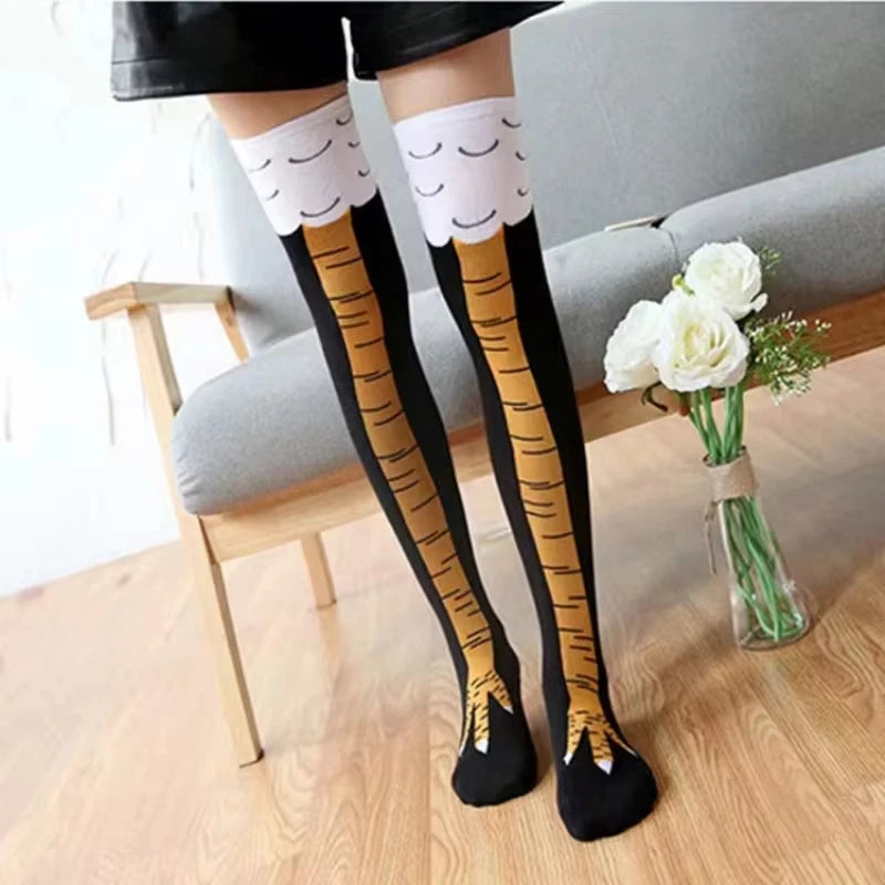 Legs wearing knee-high socks with bread design in a room setting