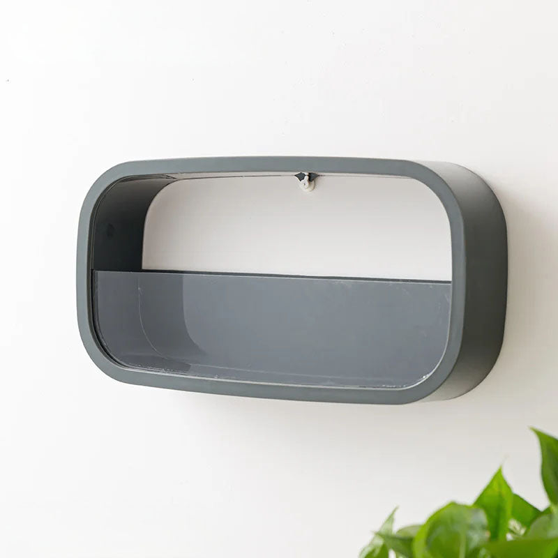 Rectangular wall-mounted mirror with a metallic frame on a white wall.