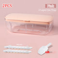 Pink two-layer ice tray set with additional components on a pink background