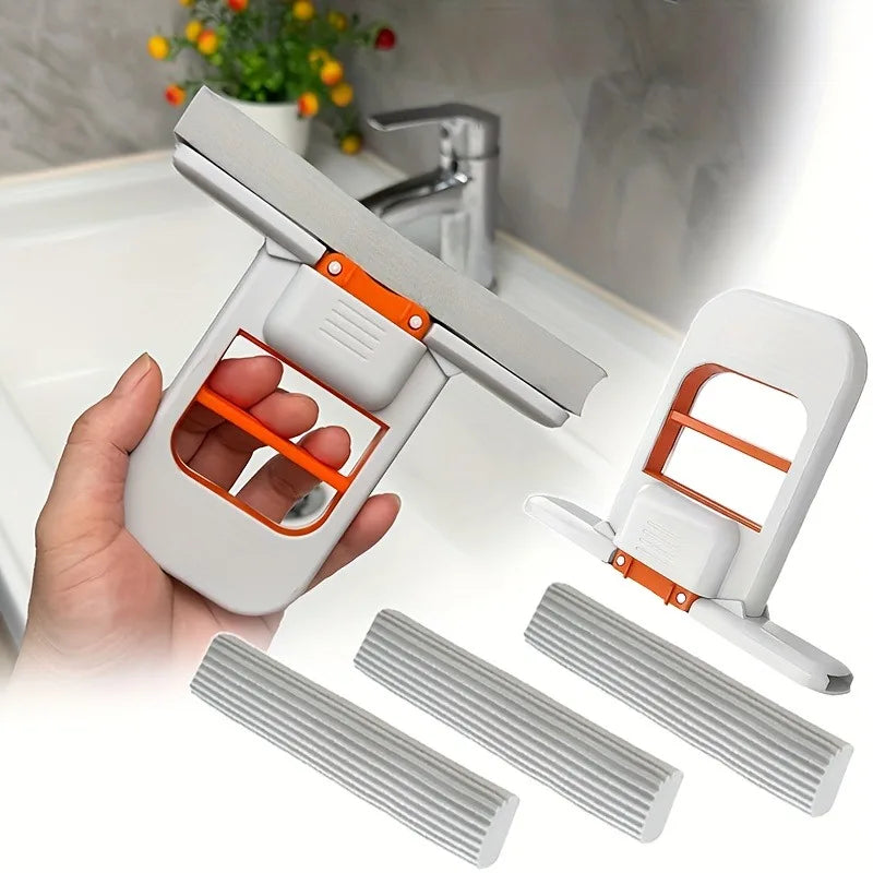 Cleaning tool with attachments held by a hand in a kitchen setting