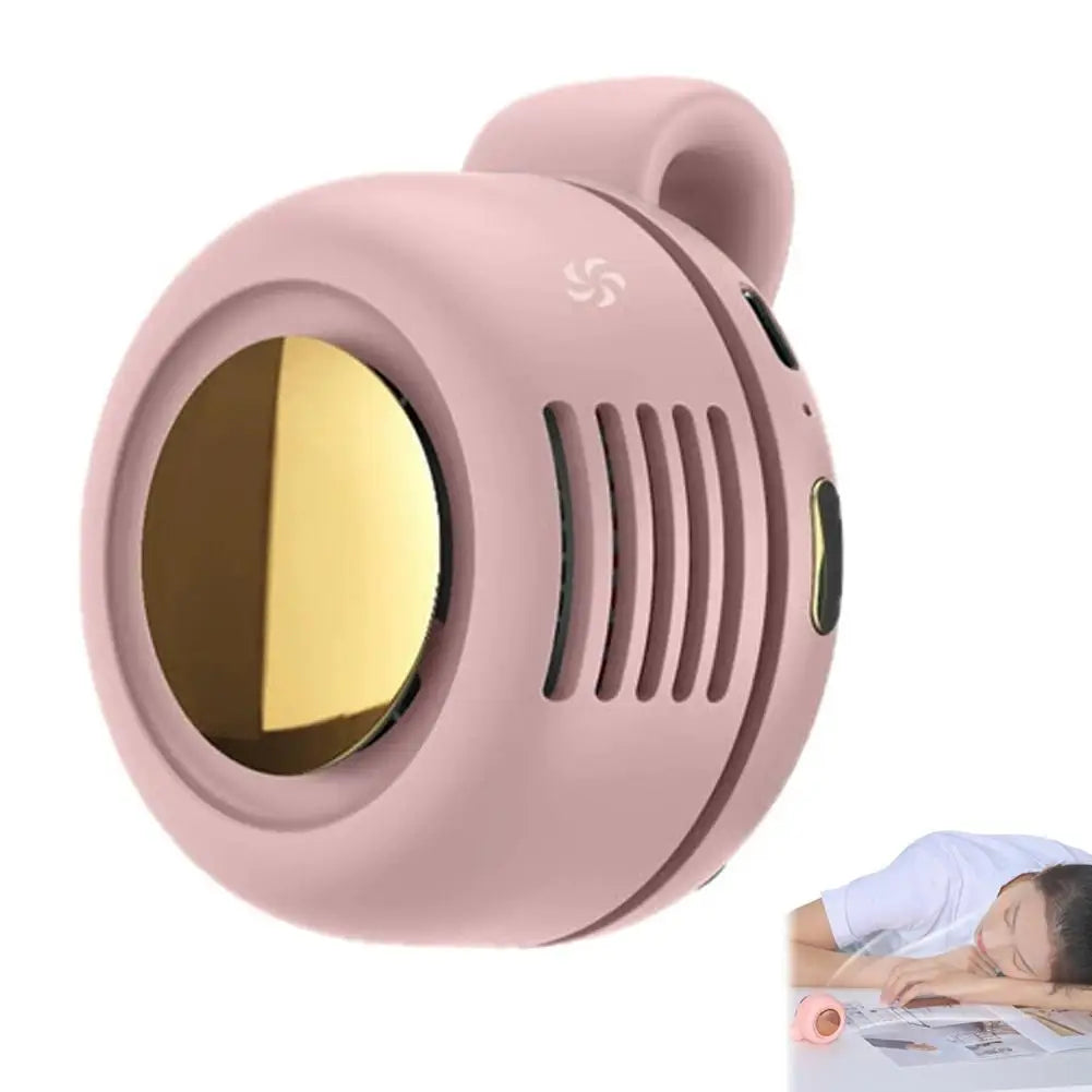 Pink handheld mirror with gold interior on a white background