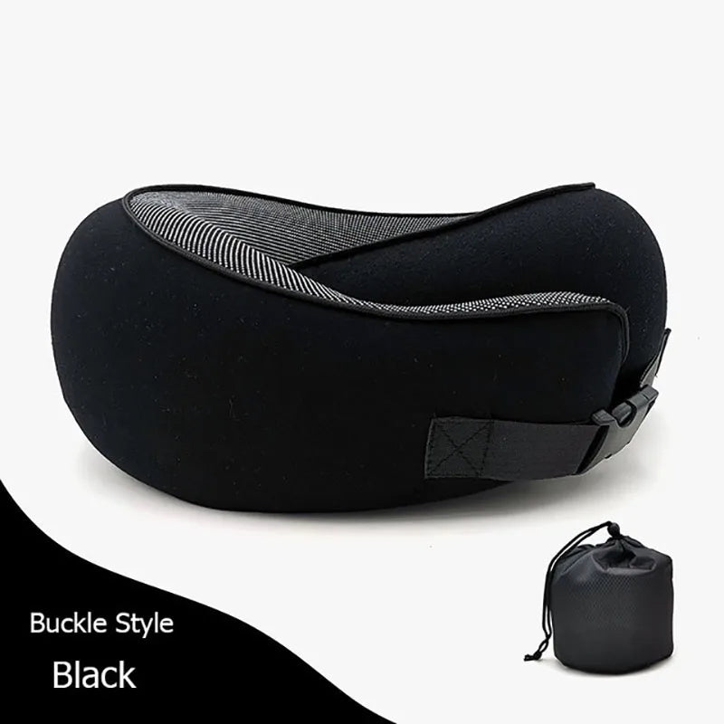 Black travel neck pillow with a small black bag on a white background