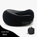 Black travel neck pillow with a small black bag on a white background