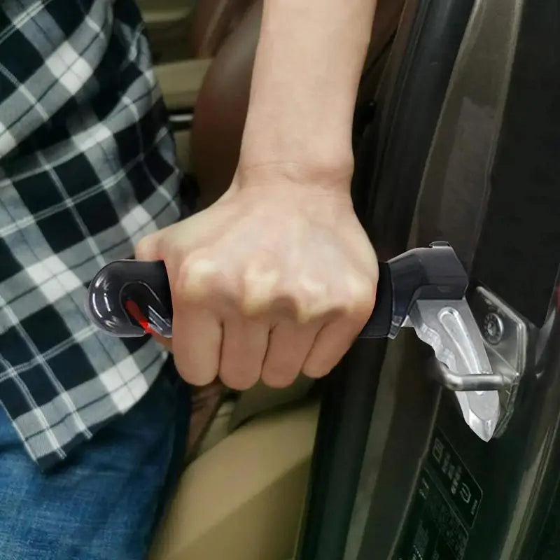 Person using a car door lock pick tool inside a vehicle.