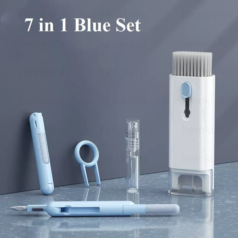 Set of 7 blue and white grooming tools on a gray surface with a dark gray background.