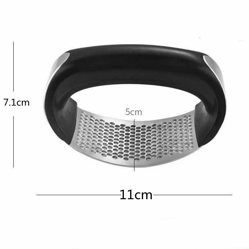 Manual garlic crusher with easy-grip handle