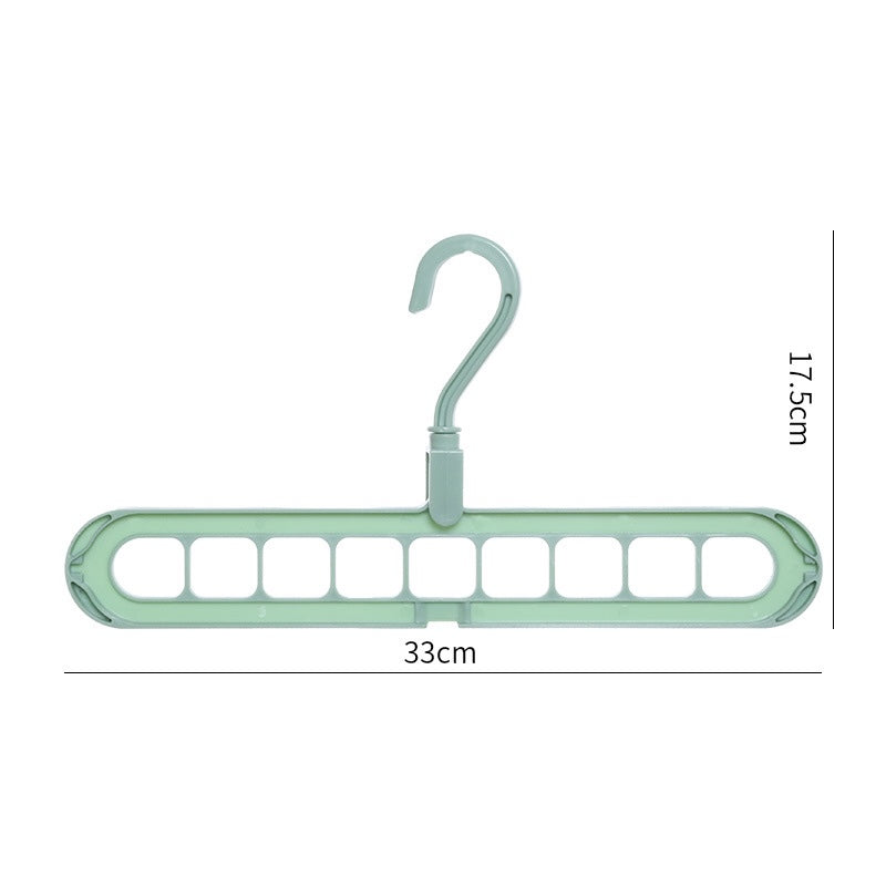 Green hanger with multiple hooks on a white background