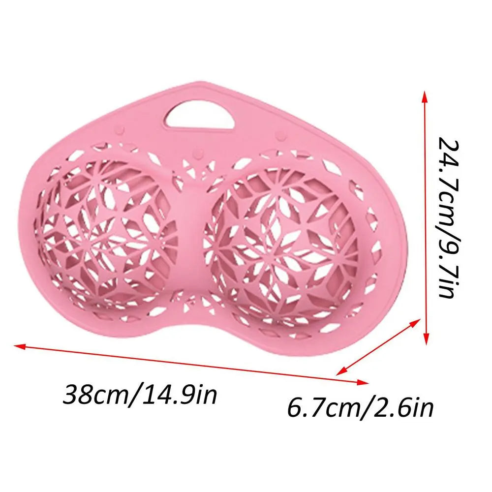 Pink silicone laundry basket with dimensions indicated on a white background