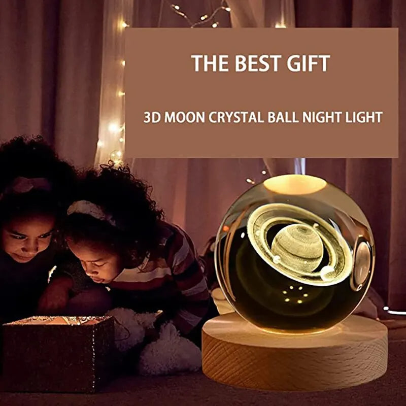 Two children looking at a 3D moon crystal ball night light with decorative lights in the background.