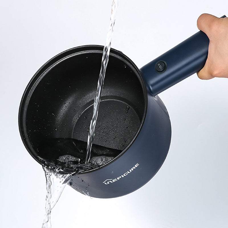Compact electric cooking pot for countertop meal preparation