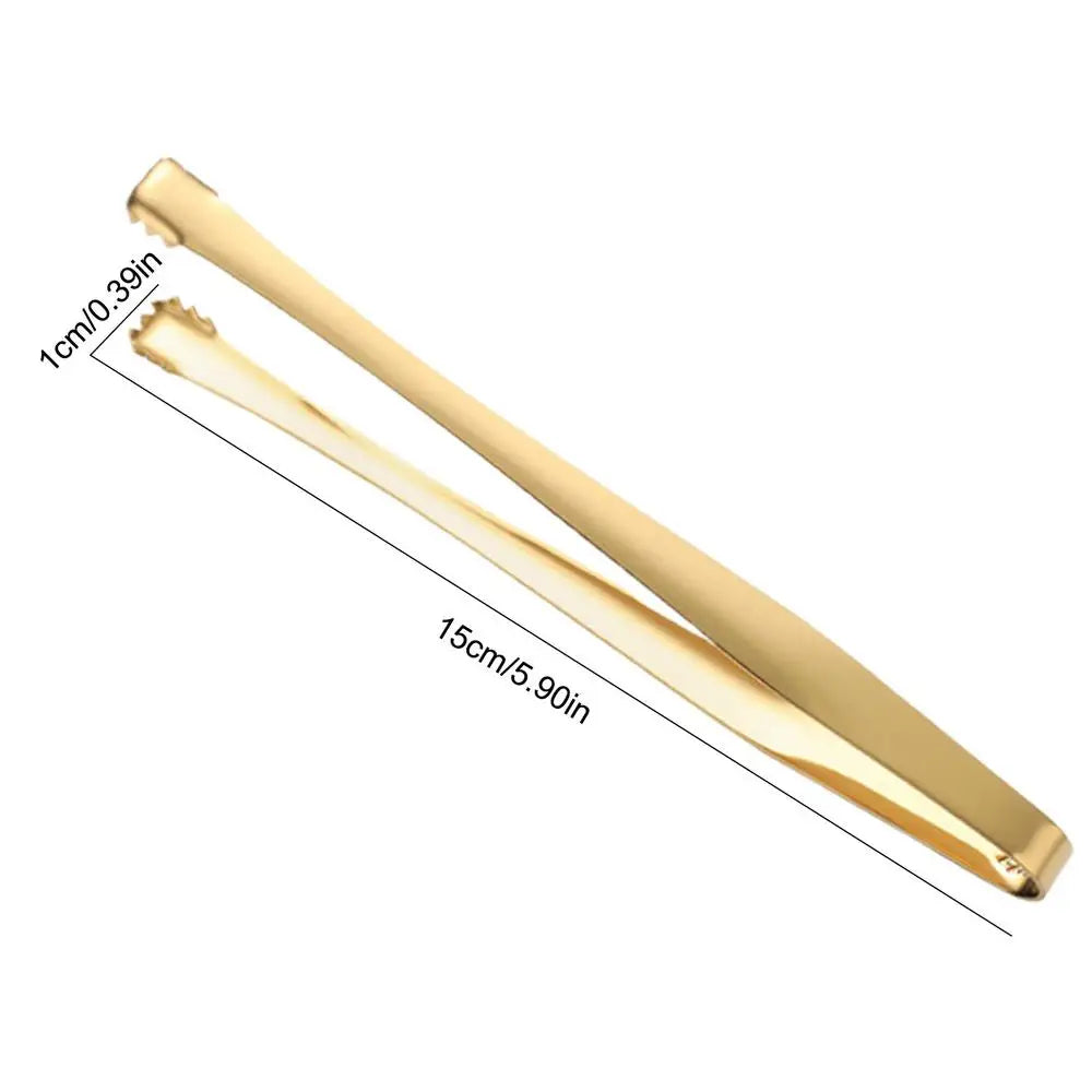 Gold tongs with measurements on a white background