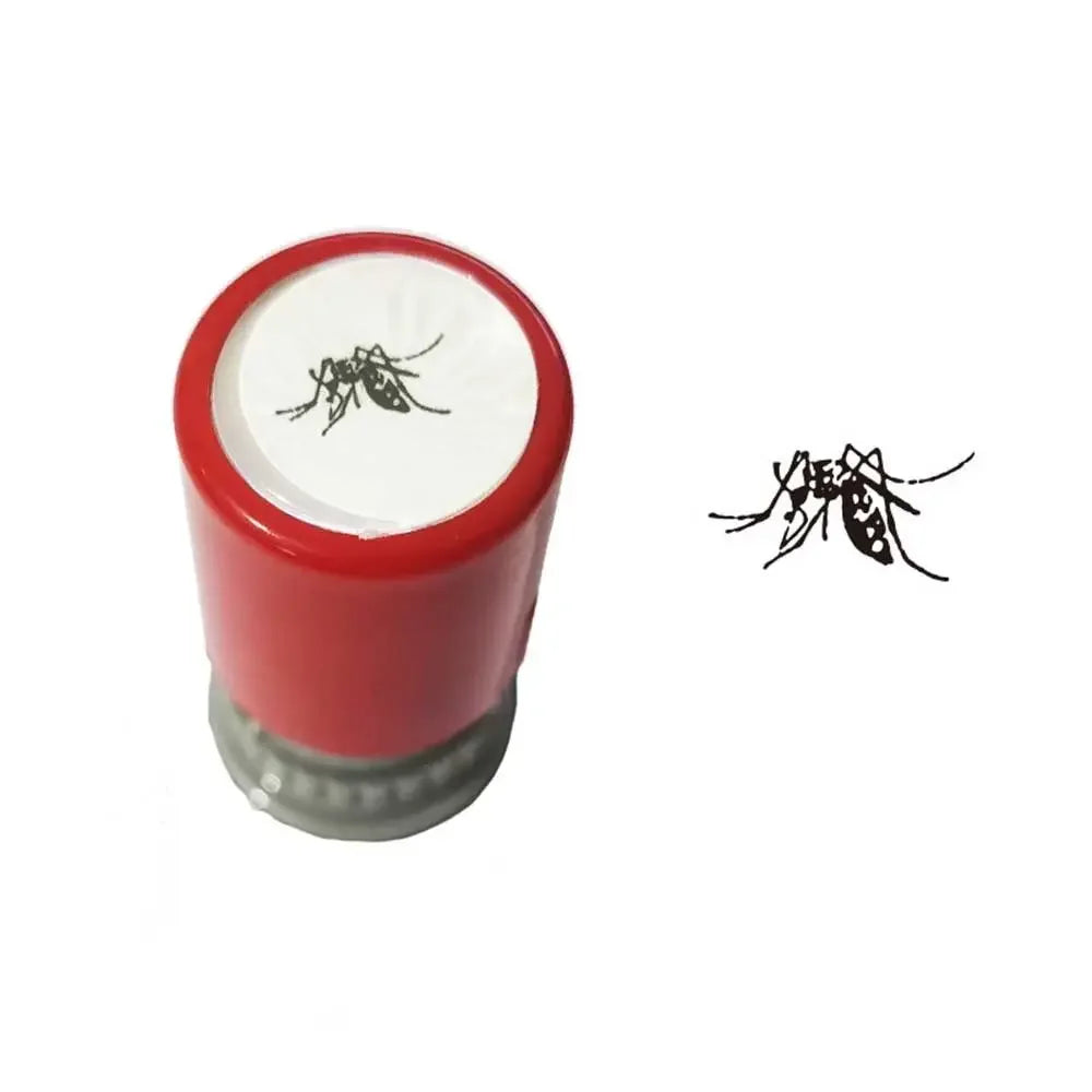 Red stamp with a white top featuring an ant design on a white background