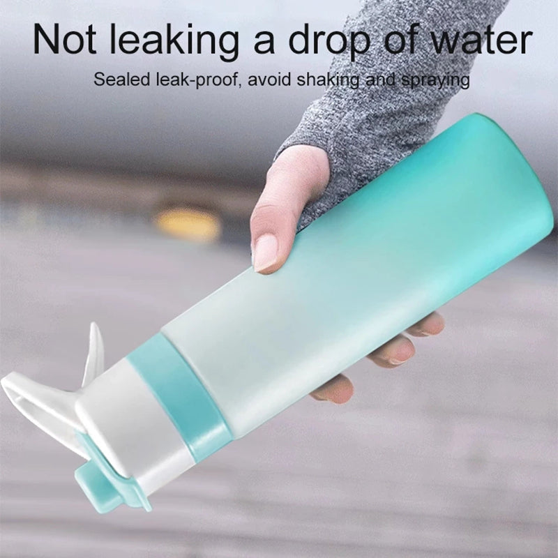Hand holding a gradient blue and white water bottle with text about its leak-proof design.