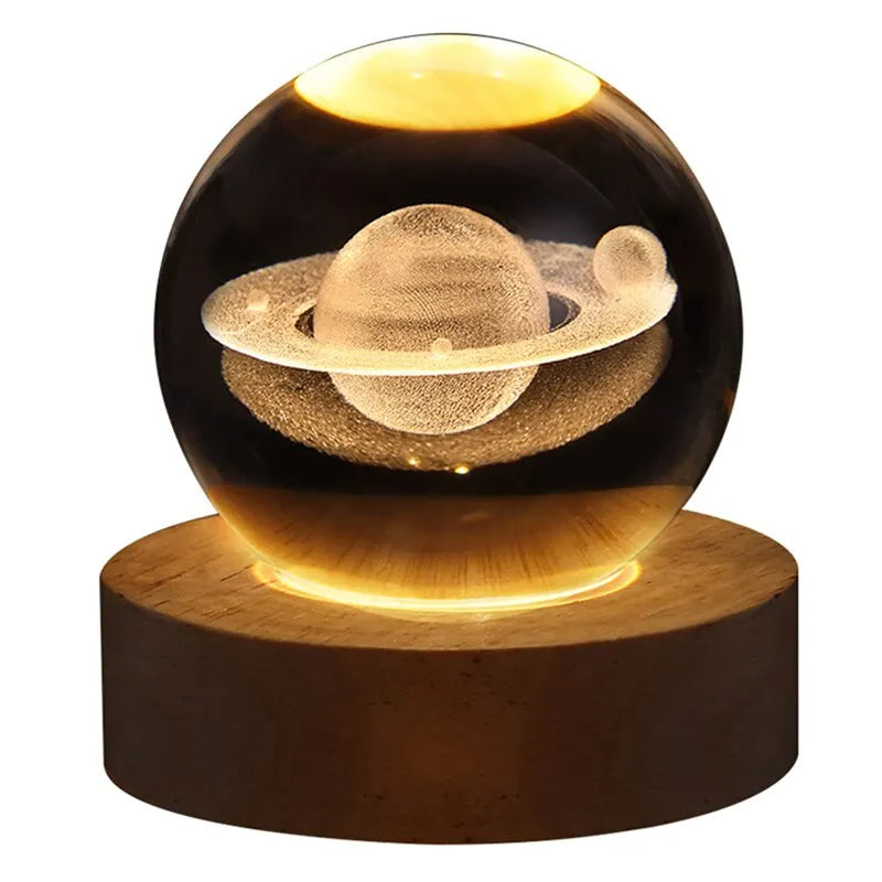 Glowing sphere with planetary design on a wooden base against a white background