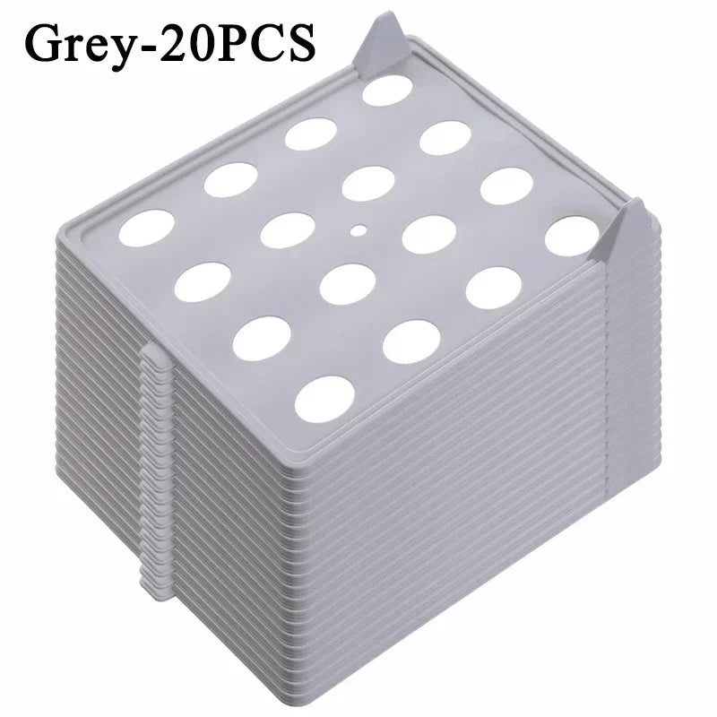 Stack of gray perforated trays with 'Grey-20PCS' text on a white background