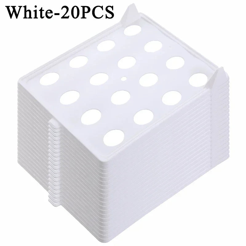 Stack of white plastic sheets with holes, labeled 'White-20PCS'.