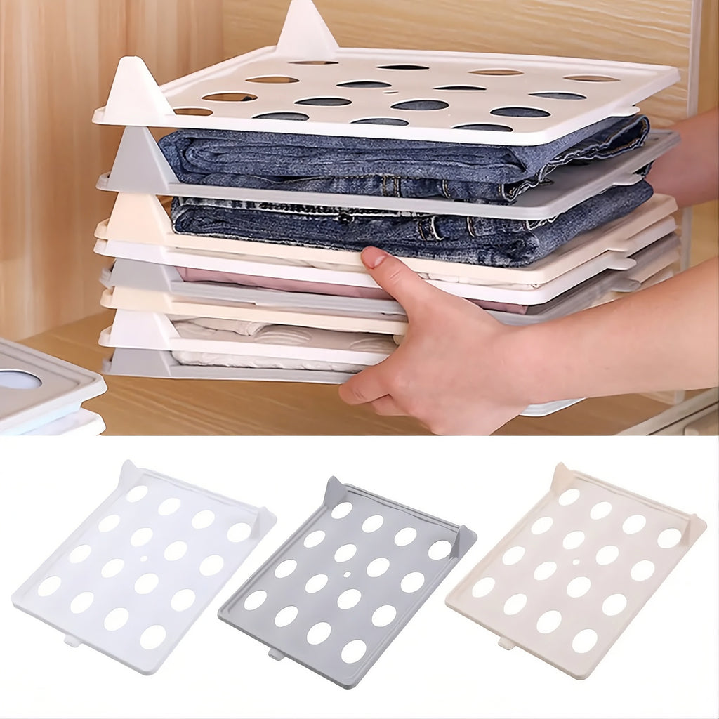 Stack of folded clothes on a transparent plastic organizer with additional organizers displayed below.