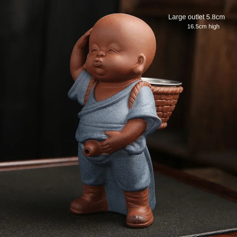 Small statue of a monk holding a basket with dimensions displayed